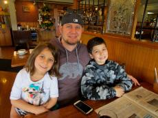 Family enjoying breakfast at Billy's Pancake House in Palatine