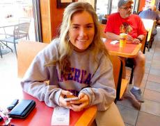 Loyal customer enjoying lunch at Brandy's Gyros in Chicago
