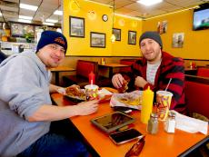 Brothers enjoying lunch at Burger Baron Restaurant in Chicago Brothers enjoying lunch at Burger Baron Restaurant in Chicago