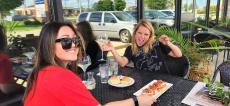 Friends enjoying outdoor dining at Ellwood Steak & Fish House in DeKalb Friends enjoying outdoor dining at Ellwood Steak & Fish House in DeKalb