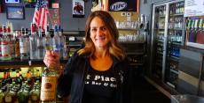 Friendly bar server at First Place Sports Bar & Grill in Hoffman Estates