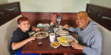 Family enjoying breakfast at Maple Butter Cafe in Plainfield