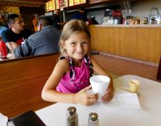 Young customer enjoying ice cream at Nick's Drive-In Chicago