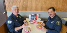 Police officers enjoying lunch at Nick's Drive-In Chicago