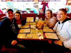 Friends enjoying breakfast at Omega Restaurant & Pancake House in Downers Grove