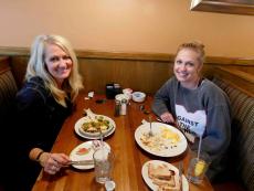Family enjoying breakfast at Savoury Restaurant & Pancake Cafe Bartlett