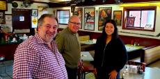 Friendly staff with customer at The Canteen Restaurant in Barrington